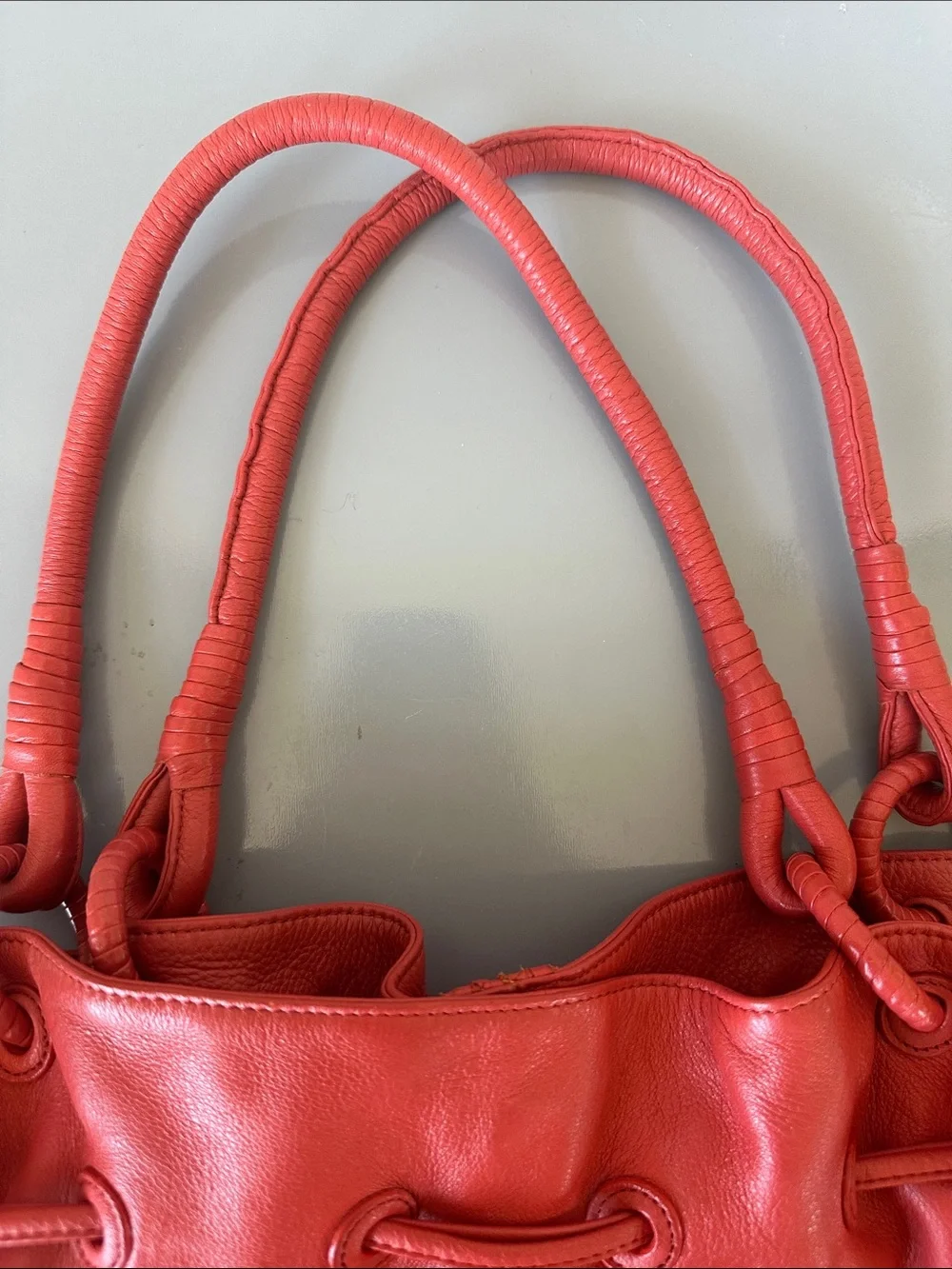 Fiore by Isabella Fiore, Deep coral/orange, 100% Leather Drawstring Tote w/ GHW